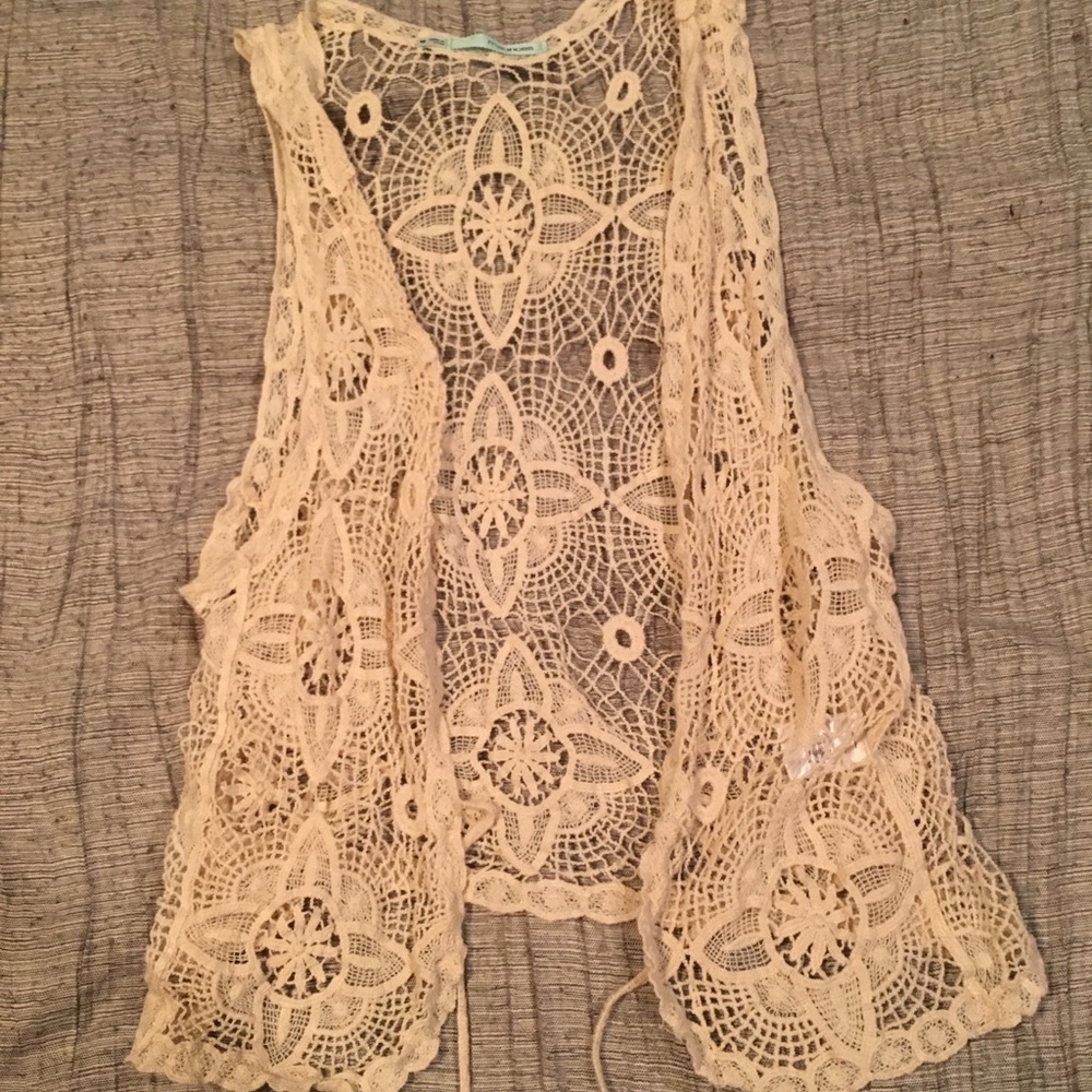 Super cute beige crochet vest!